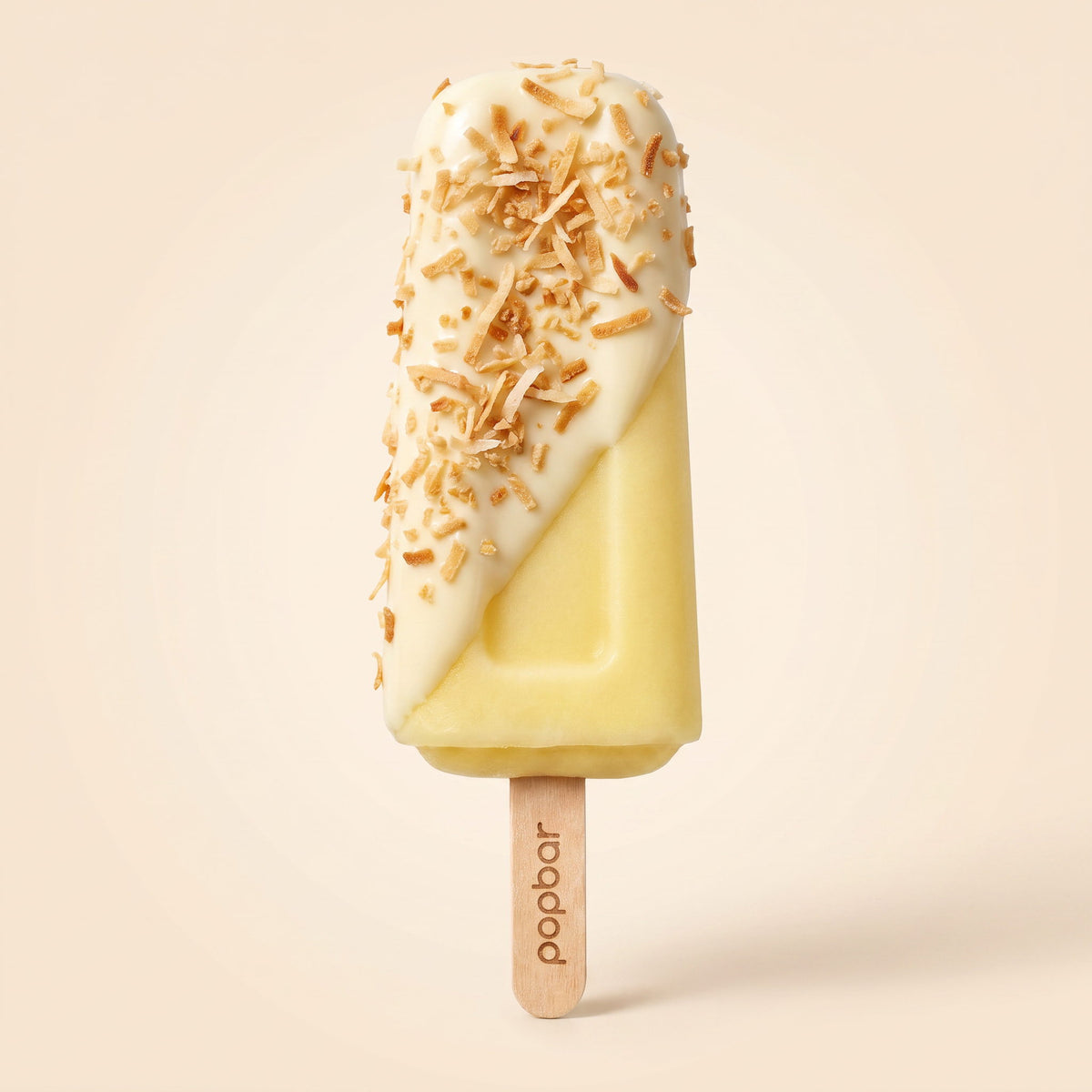 Popbar lemon sorbetto with white chocolate dip and toasted coconut