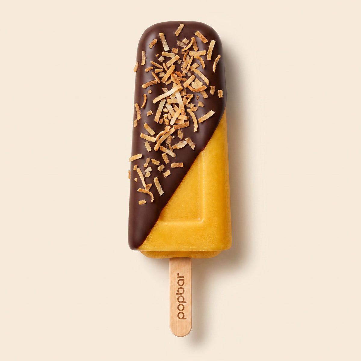 Popbar mango sorbetto with dark chocolate dip and toasted coconut