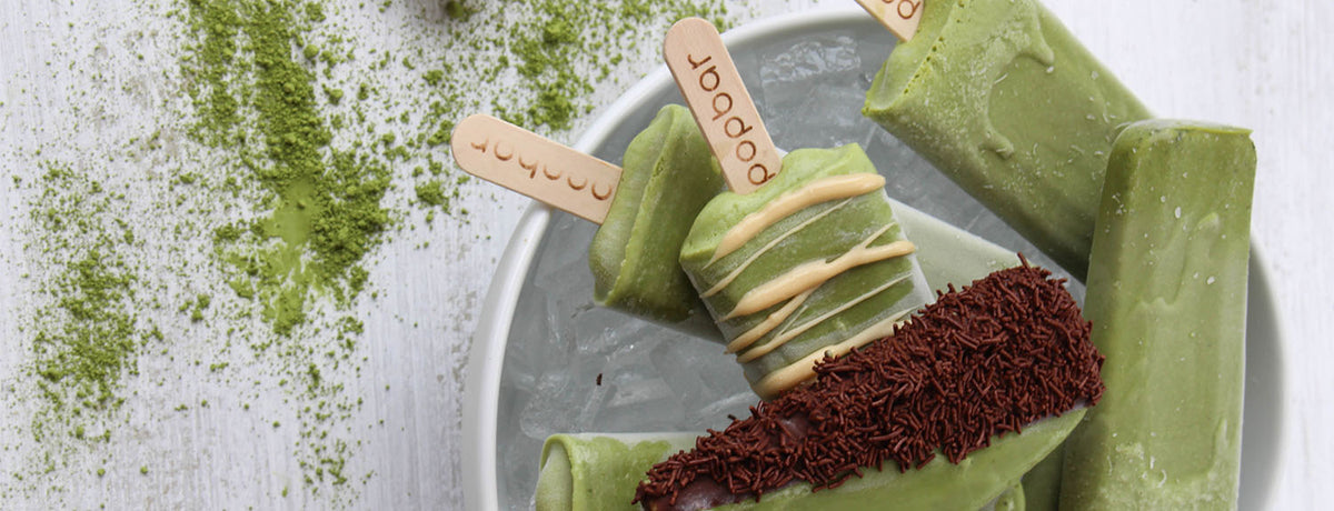 Popbar gelato pops lined up in the shop display case.